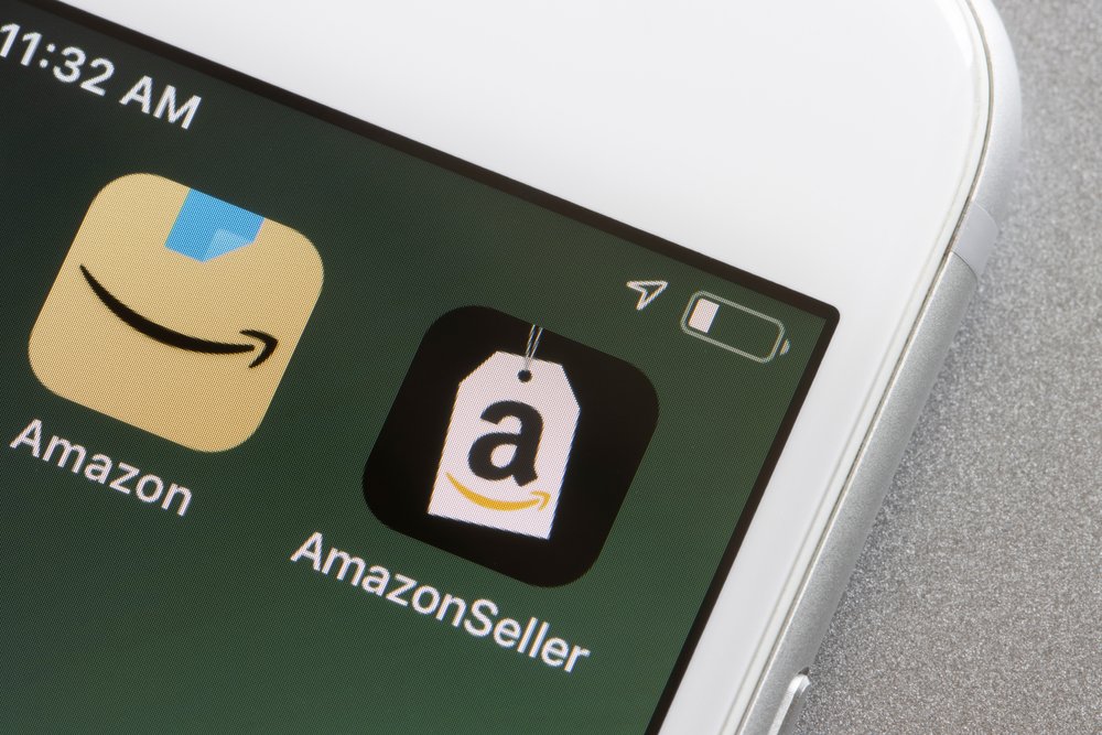 Amazon Seller and Amazon Shopping apps are seen on an iPhone. 